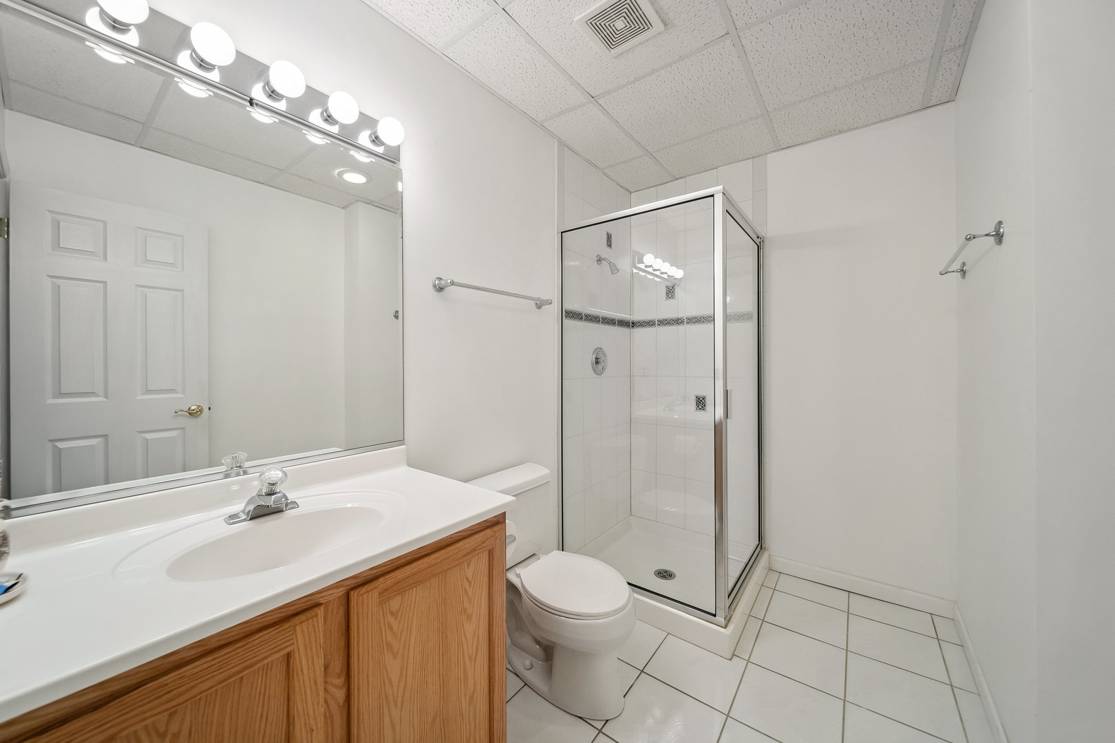 Undisclosed Address Park Ridge, IL 60068 - Photo 38 of 47 a bathroom with a sink toilet and shower