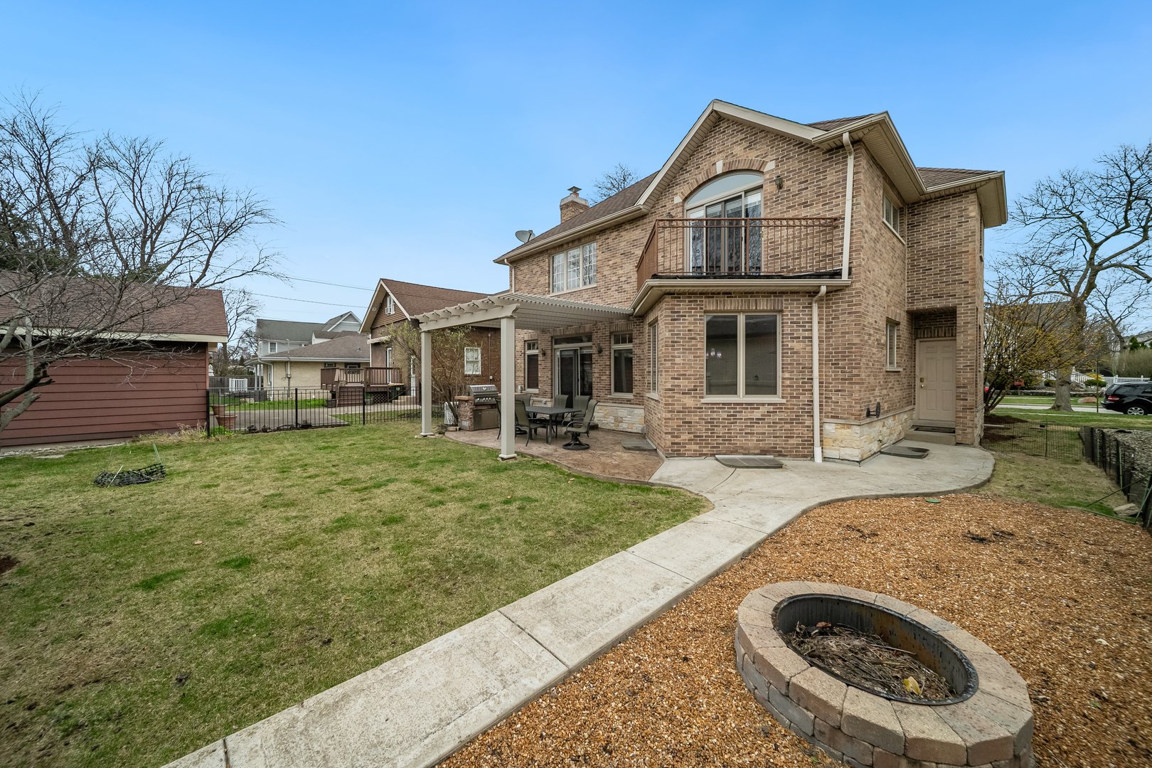 Undisclosed Address Park Ridge, IL 60068 - Photo 44 of 47 a front view of a house with a garden and yard