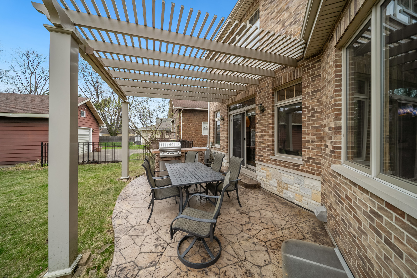 Undisclosed Address Park Ridge, IL 60068 - Photo 46 of 47 a patio with glass table and chairs