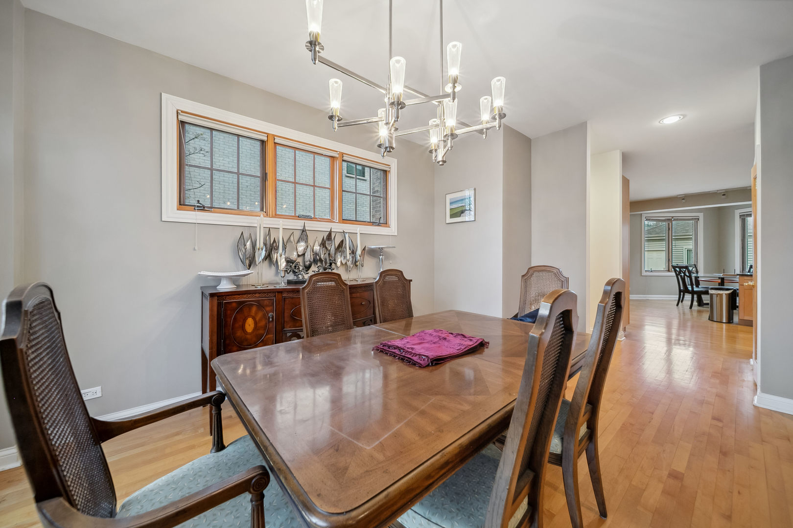 Undisclosed Address Park Ridge, IL 60068 - Photo 5 of 47 a view of a dining room with furniture and wooden floor
