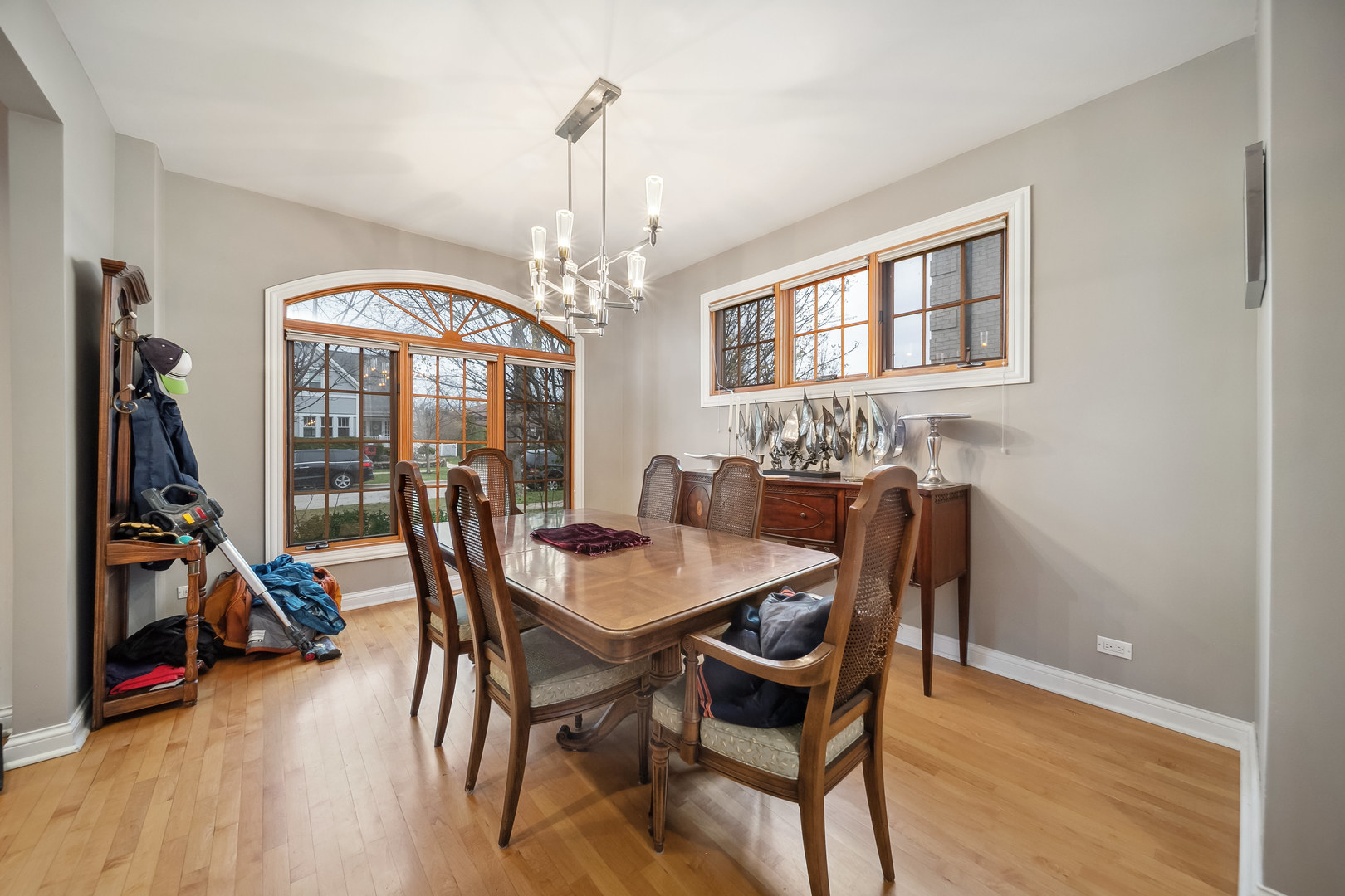 Undisclosed Address Park Ridge, IL 60068 - Photo 6 of 47 a view of a dining room with furniture window and wooden floor