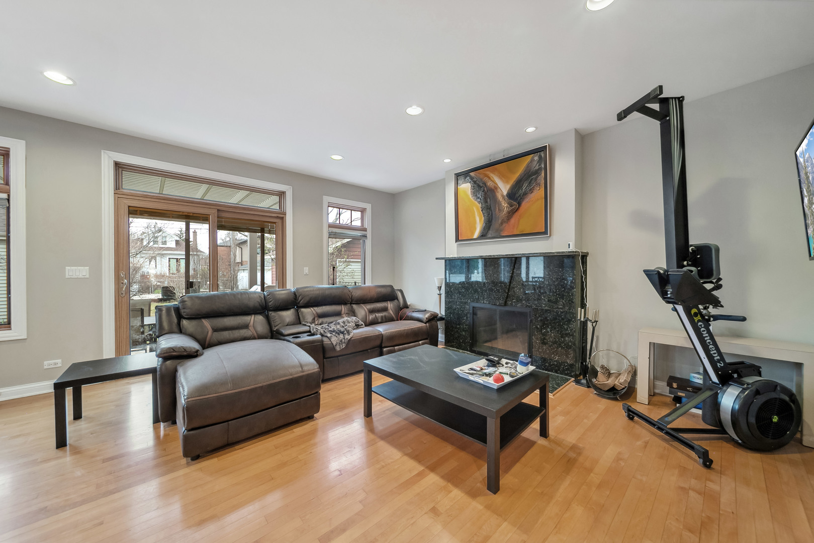 Undisclosed Address Park Ridge, IL 60068 - Photo 9 of 47 a living room with furniture a rug and a fireplace