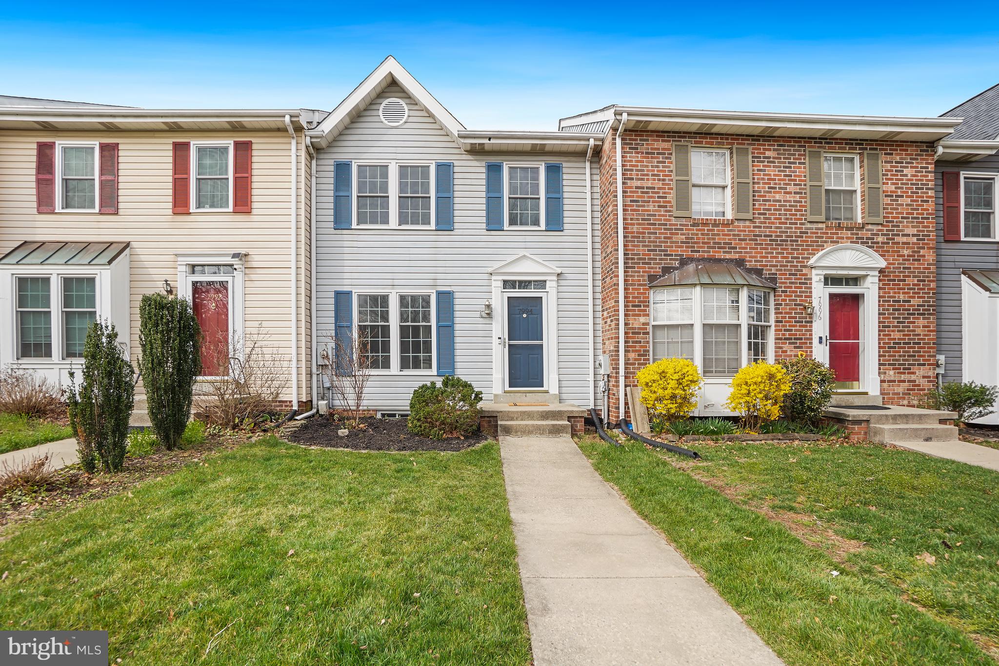 7994 Windsail Court Frederick, MD 21701 - Photo 1 of 46 a front view of a house with a yard