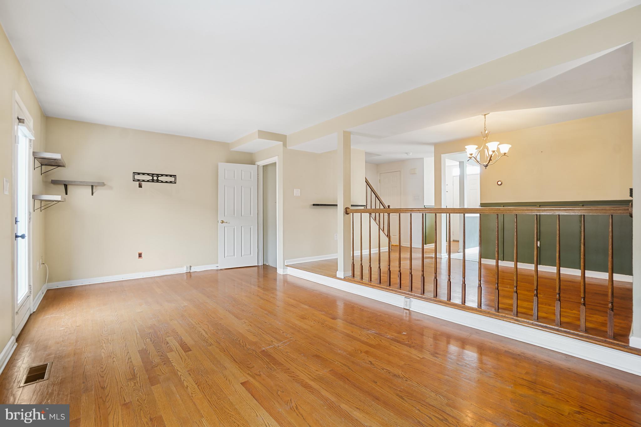 7994 Windsail Court Frederick, MD 21701 - Photo 19 of 46 a view of a room with wooden floor