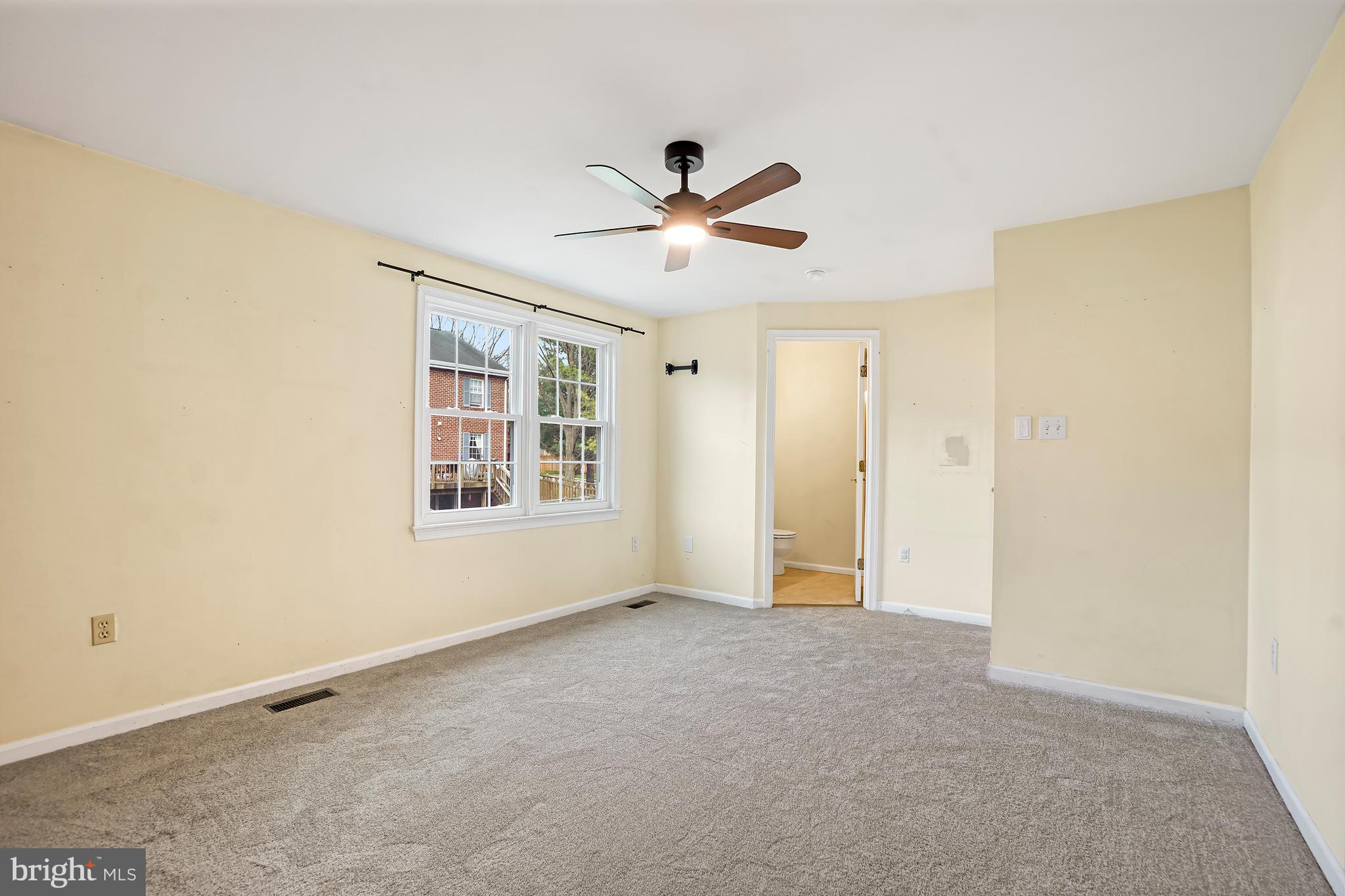 7994 Windsail Court Frederick, MD 21701 - Photo 25 of 46 a view of an empty room with a window