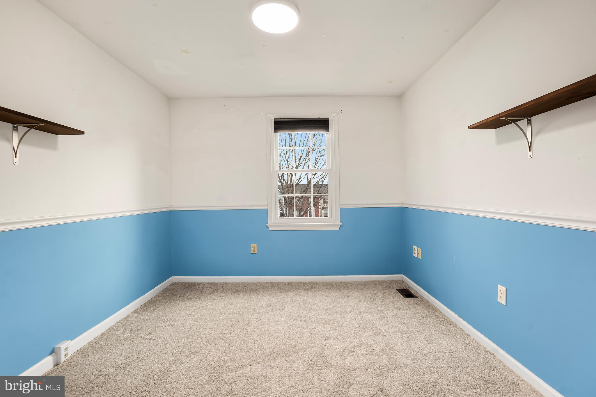 7994 Windsail Court Frederick, MD 21701 - Photo 30 of 46 a view of a room with a empty space and window