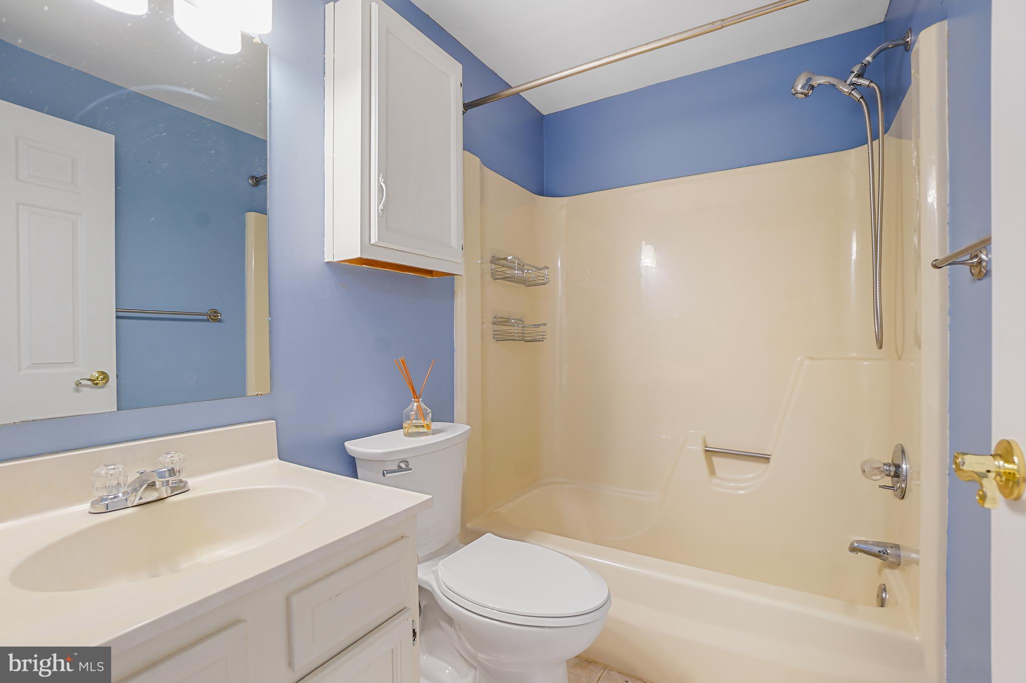7994 Windsail Court Frederick, MD 21701 - Photo 32 of 46 a bathroom with a sink toilet and shower