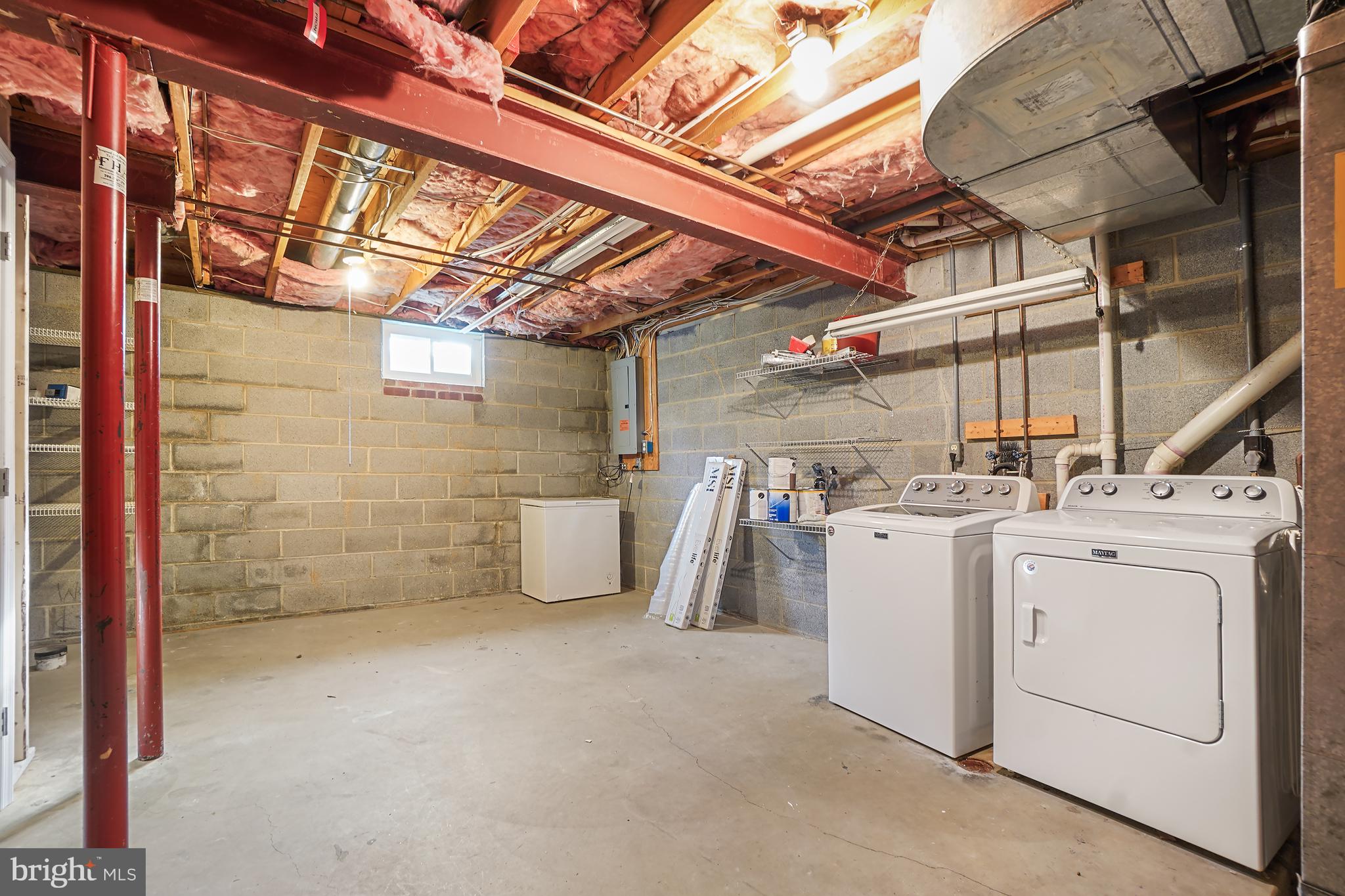 7994 Windsail Court Frederick, MD 21701 - Photo 40 of 46 a view of a storage & utility room with dryer and washer
