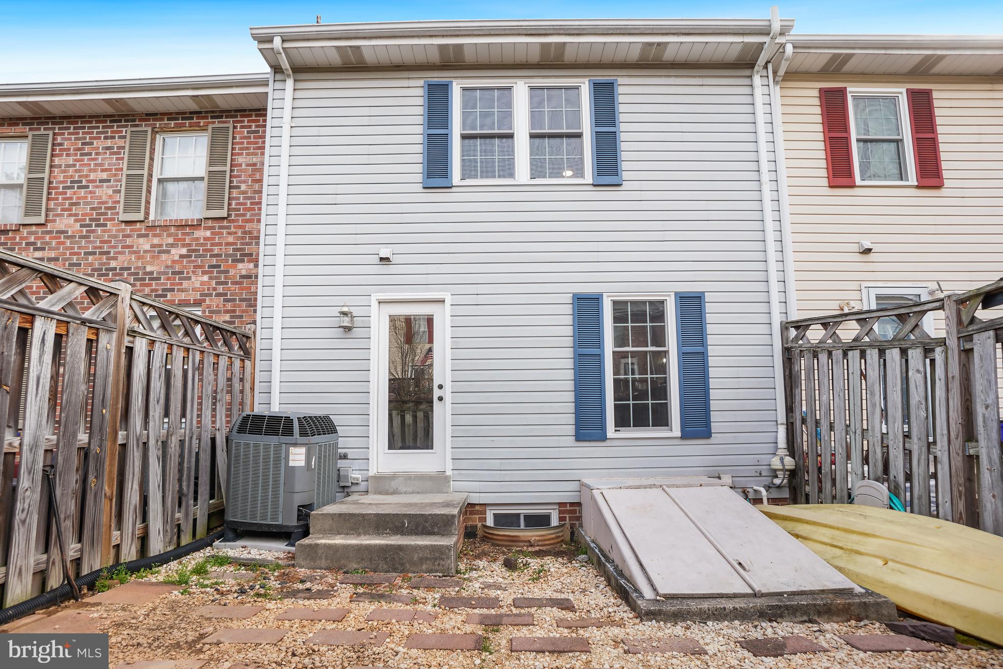 7994 Windsail Court Frederick, MD 21701 - Photo 42 of 46 a front view of a house with a yard