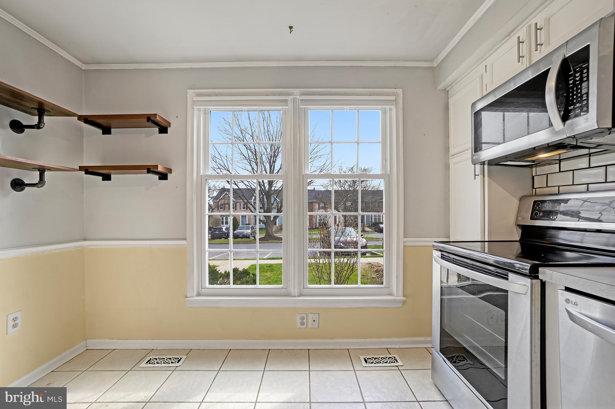 7994 Windsail Court Frederick, MD 21701 - Photo 9 of 46 a view of kitchen and utility room