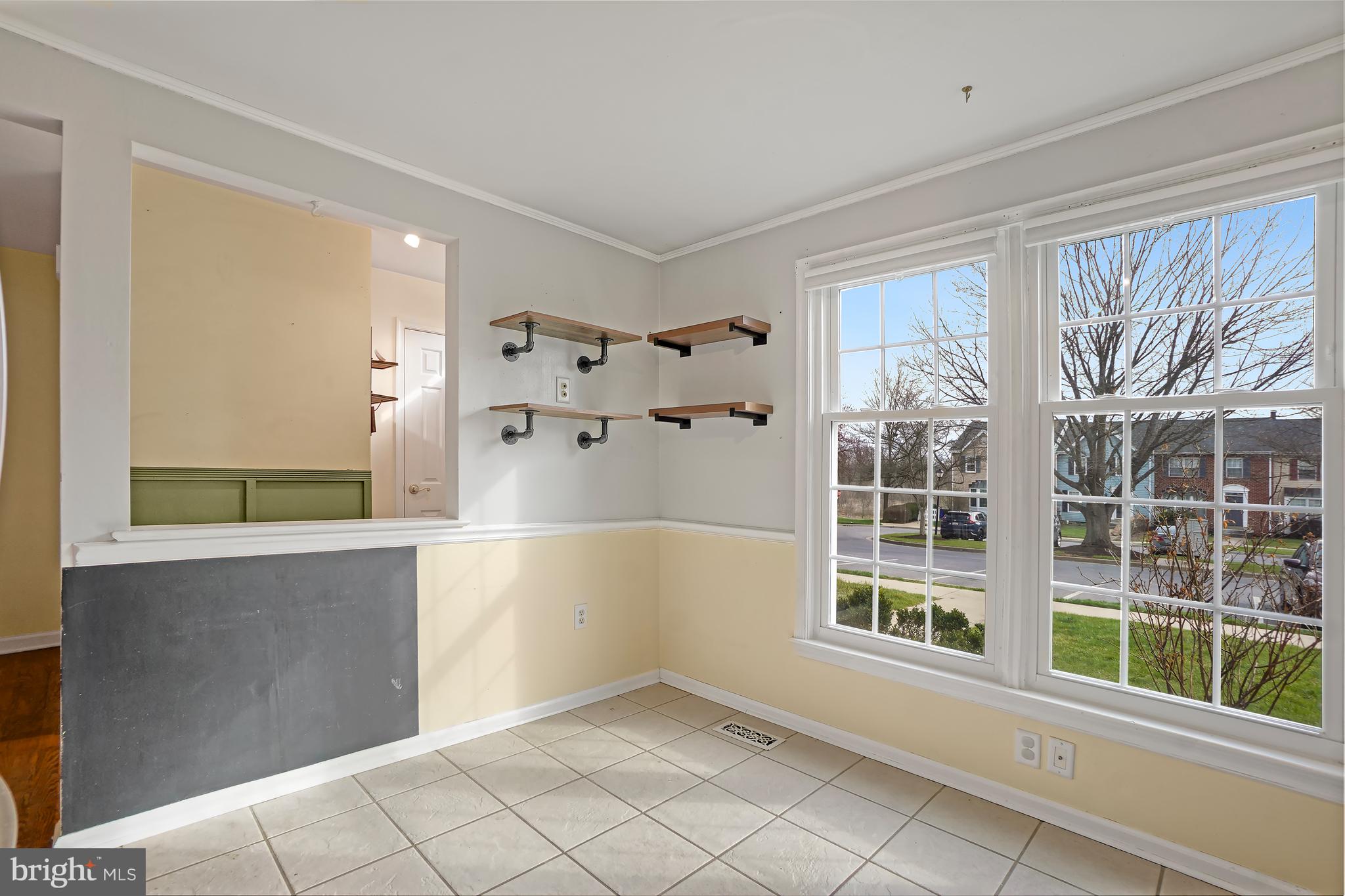 7994 Windsail Court Frederick, MD 21701 - Photo 10 of 46 a view of a big room with windows and entryway