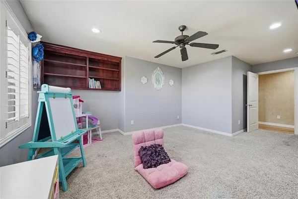 a spacious bathroom with a granite countertop sink mirror and a