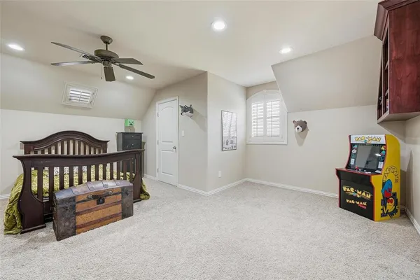 a bathroom with a toilet a sink and a mirror