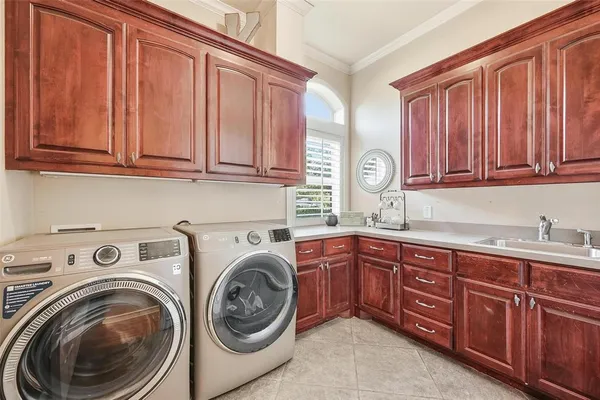 a bathroom with a toilet a sink and bathtub