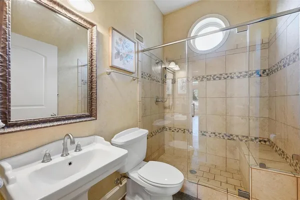 a utility room with sink dryer and washer