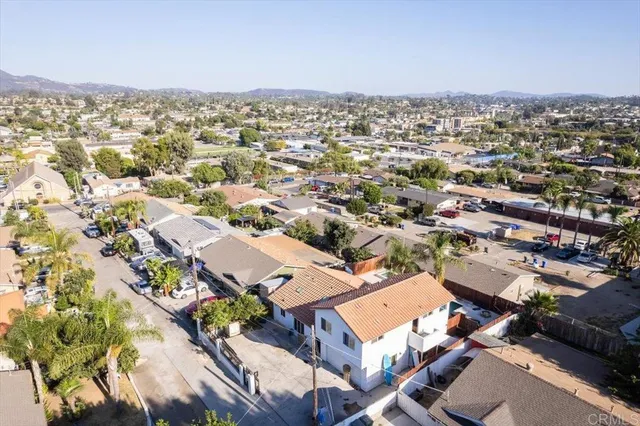 an aerial view of a city with lots of residential buildings