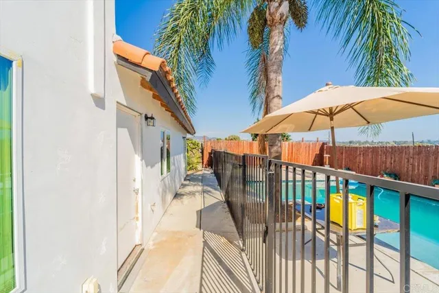 a view of a balcony with an outdoor space