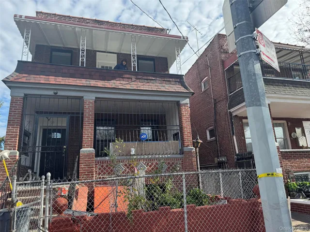 front view of a house with a balcony