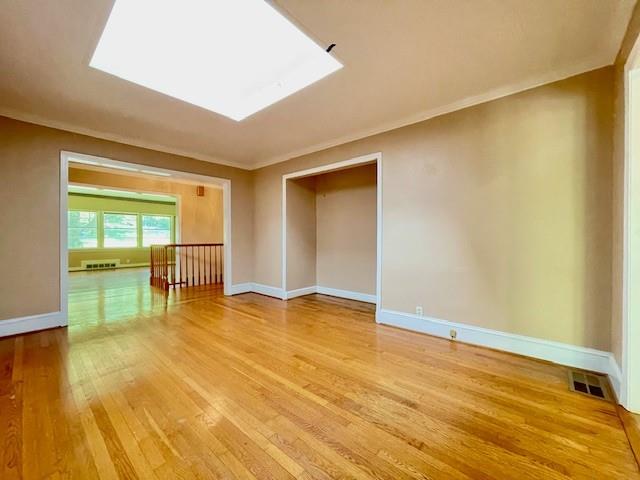 2396 Lavista Road Northeast Atlanta, GA 30329 - Photo 5 of 28 a view of an empty room with wooden floor