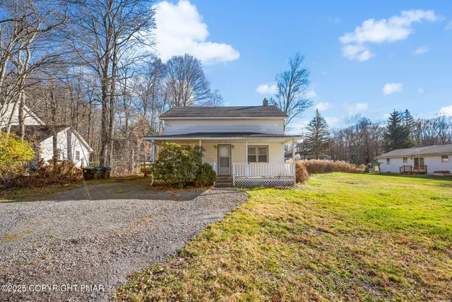 a front view of house with yard