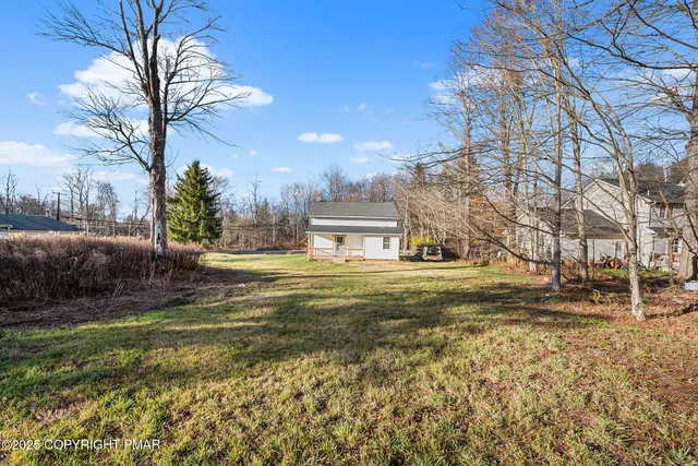 a view of a yard with a fountain