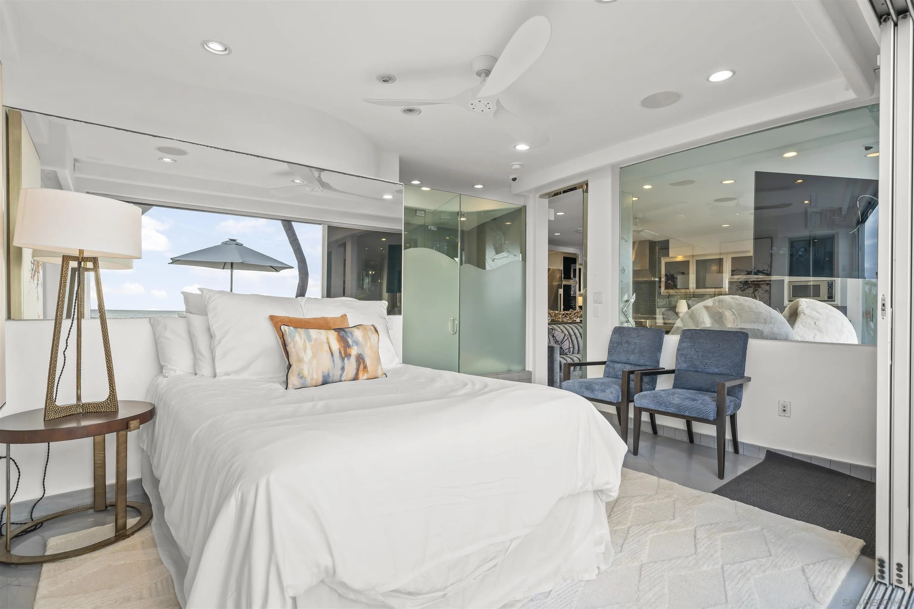 2999 Ocean Front Walk, Unit 1 San Diego, CA 92109 - Photo 19 of 37 a bedroom with a bed and a chair