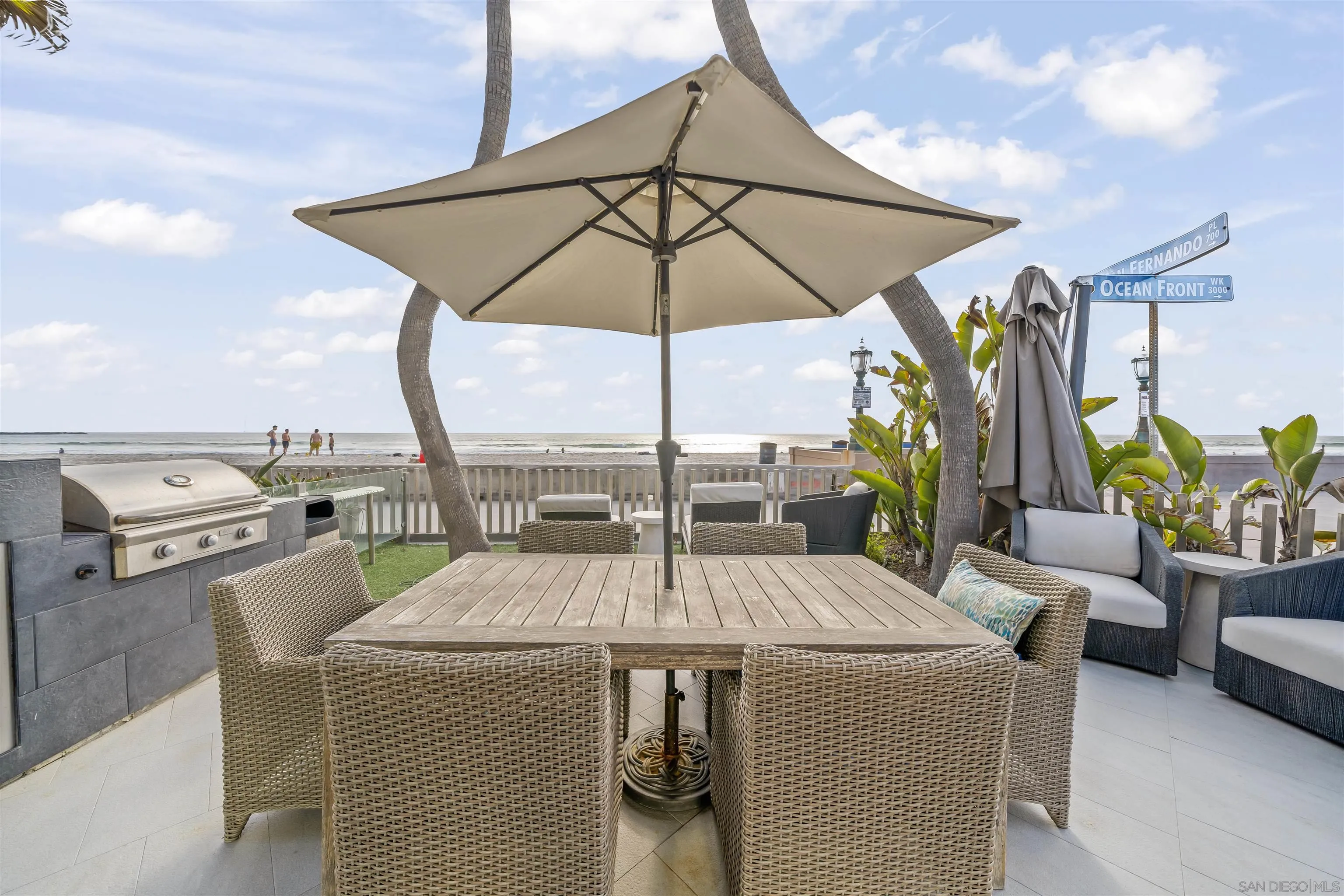 2999 Ocean Front Walk, Unit 1 San Diego, CA 92109 - Photo 10 of 37 a view of outdoor kitchen with seating area