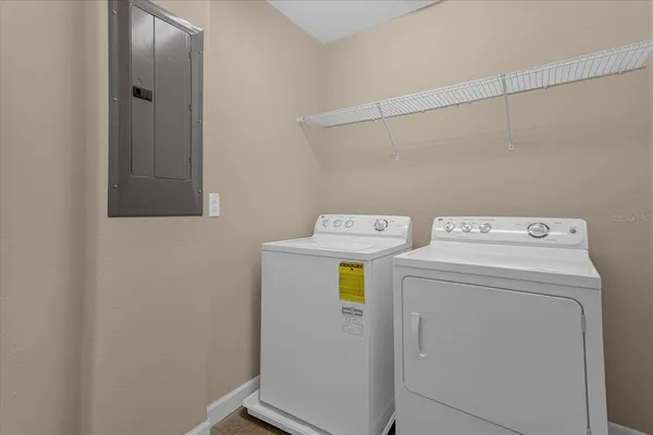a utility room with dryer and washer