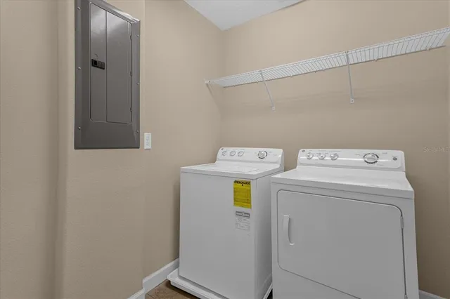 a utility room with dryer and washer