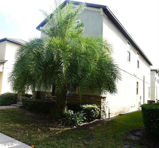 a view of backyard with green space