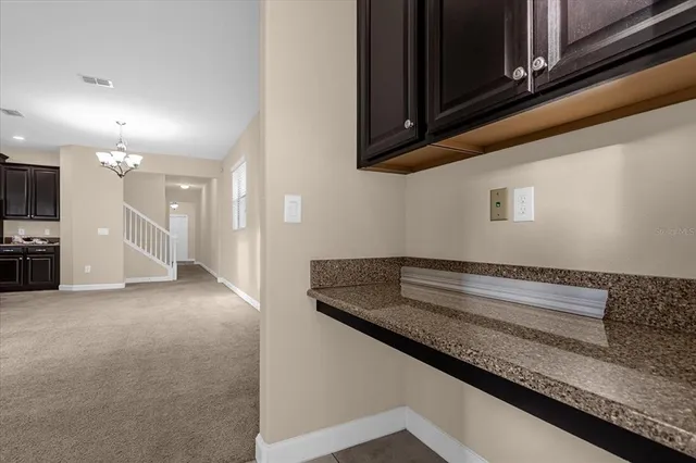 a view of kitchen and utility room