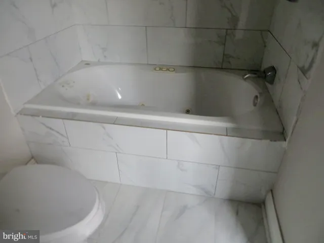 a bathroom with a bathtub