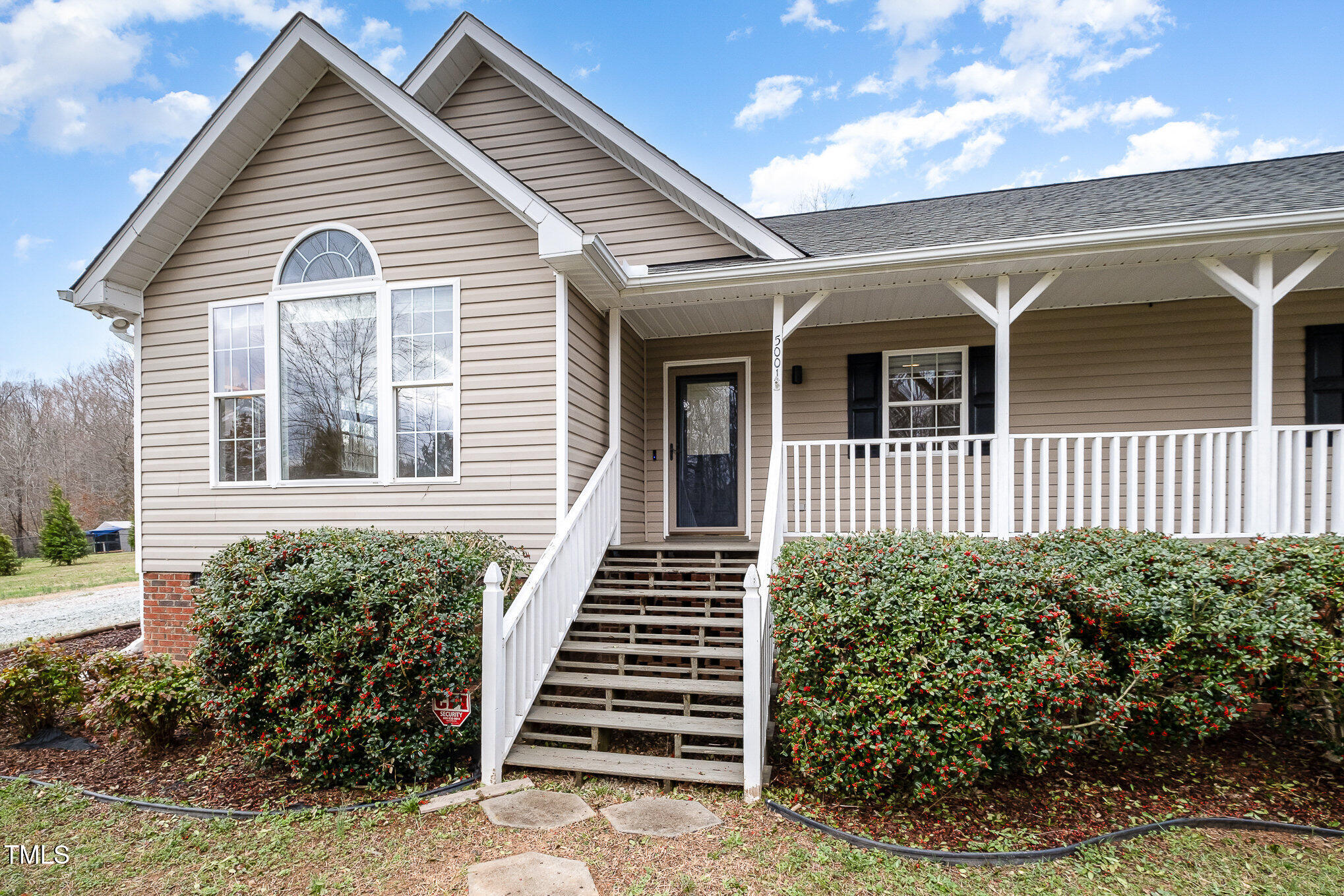 5001 West Pool Road Rougemont, NC 27572 - Photo 3 of 29 a front view of a house with a yard
