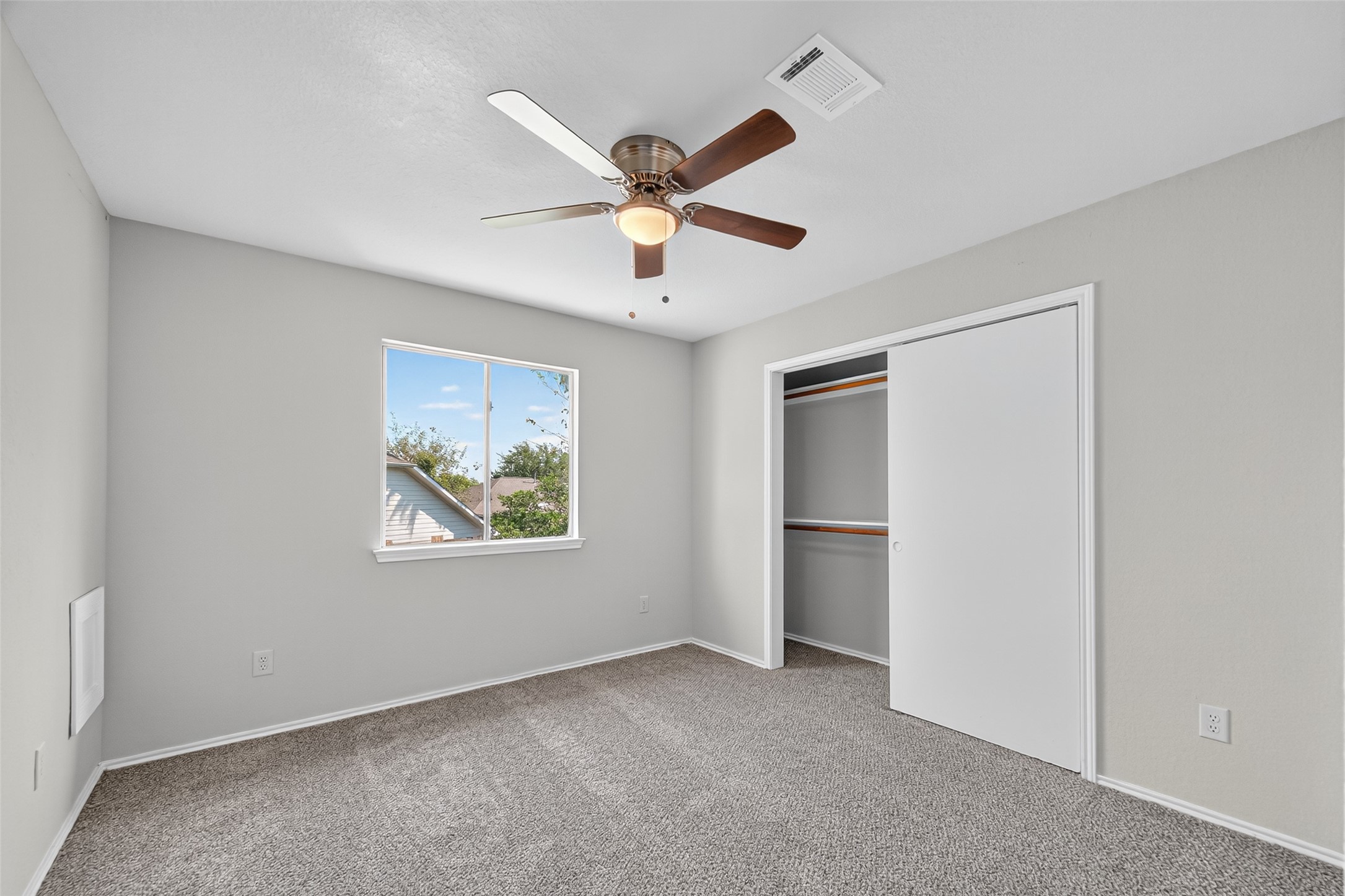 7926 Sundance Court Baytown, TX 77521 - Photo 16 of 32 a view of an empty room with a window