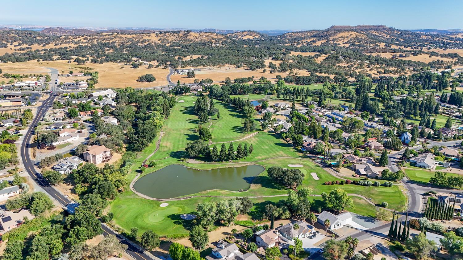 1116 Paradise Peak Road Valley Springs, CA 95252 - Photo 15 of 18 an aerial view of residential houses with outdoor space and trees