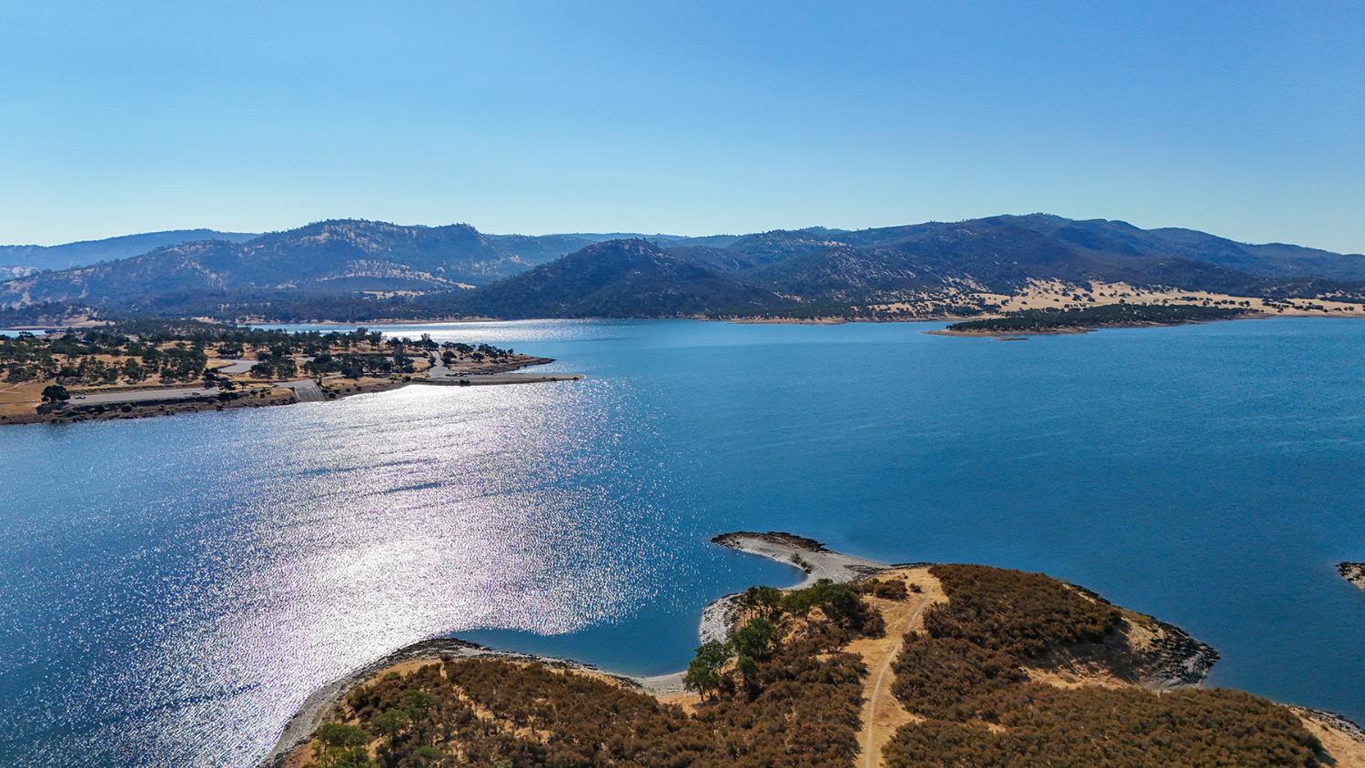 1116 Paradise Peak Road Valley Springs, CA 95252 - Photo 17 of 18 a view of a large body of water and mountain view