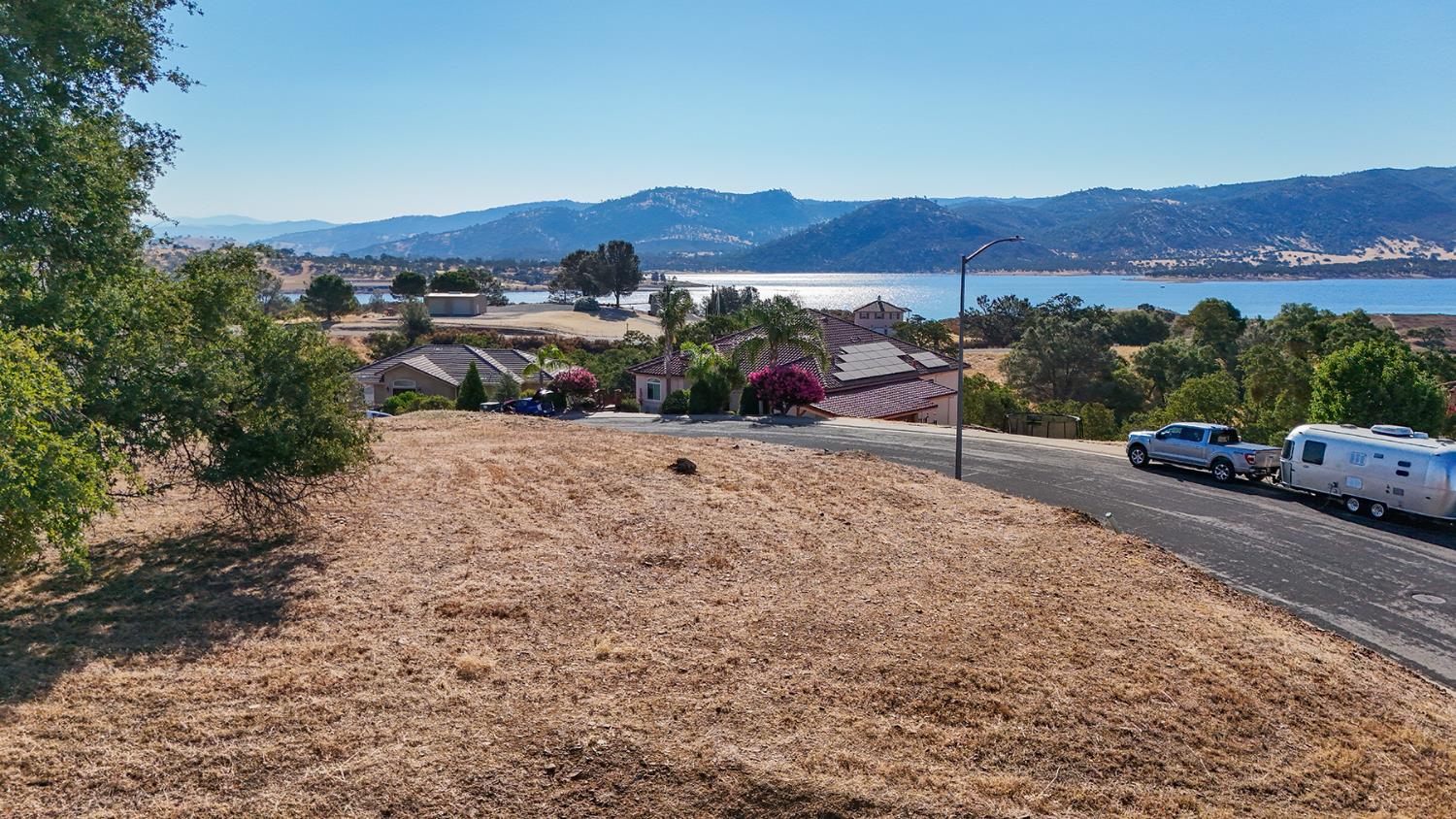 1116 Paradise Peak Road Valley Springs, CA 95252 - Photo 4 of 18 a view of street with a car parked on the road