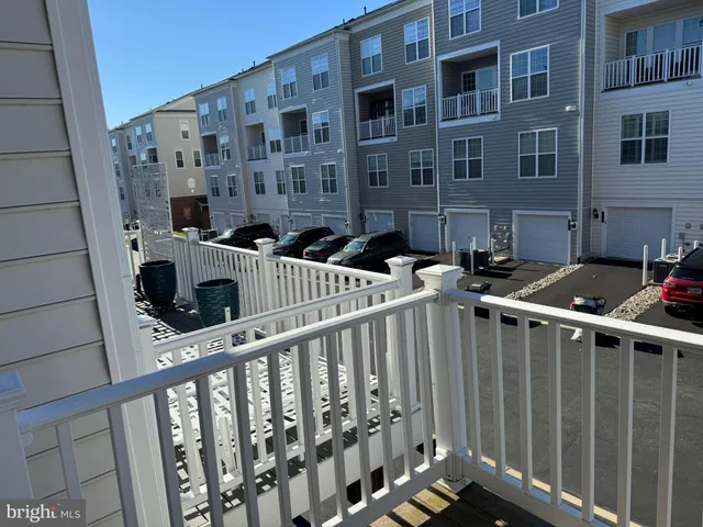 a front view of a building with glass windows