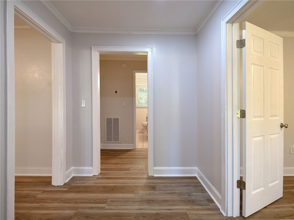 3517 Shawnee Avenue Anderson, SC 29626 - Photo 16 of 25 Clean lines and a wood-look floor provide a versatile canvas for living.