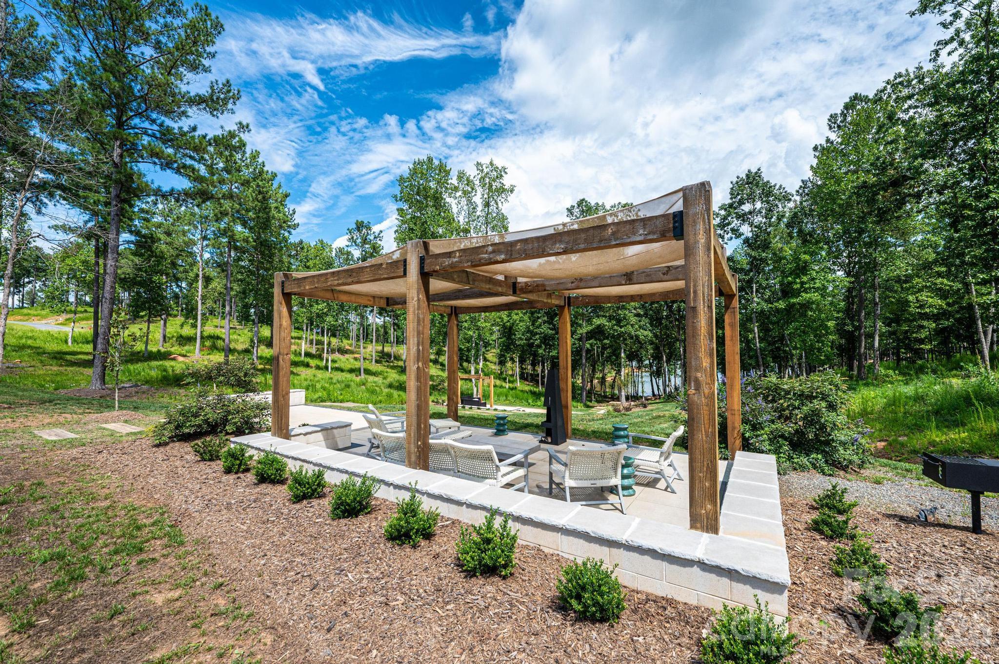 2188 Snowmass Drive Connelly Springs, NC 28612 - Photo 16 of 17 a view of house with backyard and outdoor seating