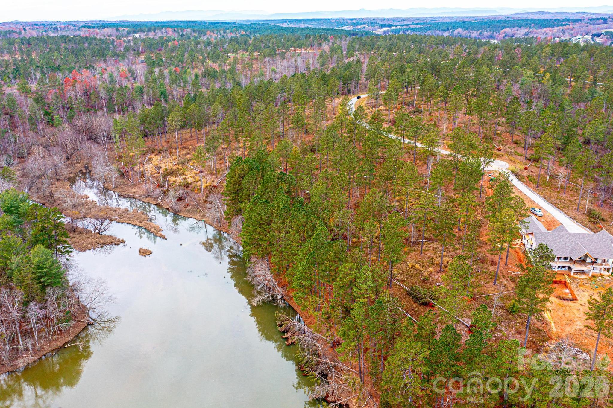 2188 Snowmass Drive Connelly Springs, NC 28612 - Photo 9 of 17 a view of lake with mountain