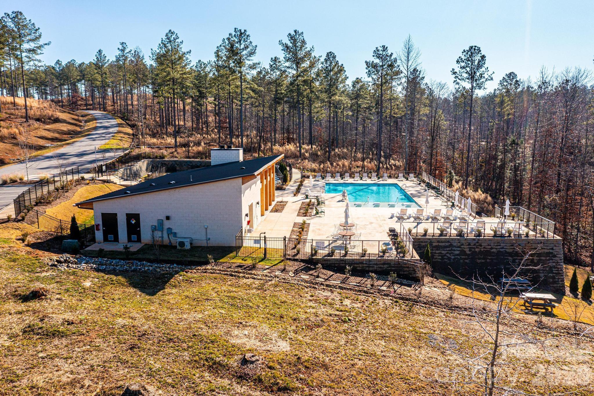 2188 Snowmass Drive Connelly Springs, NC 28612 - Photo 10 of 17 a view of a swimming pool with a patio