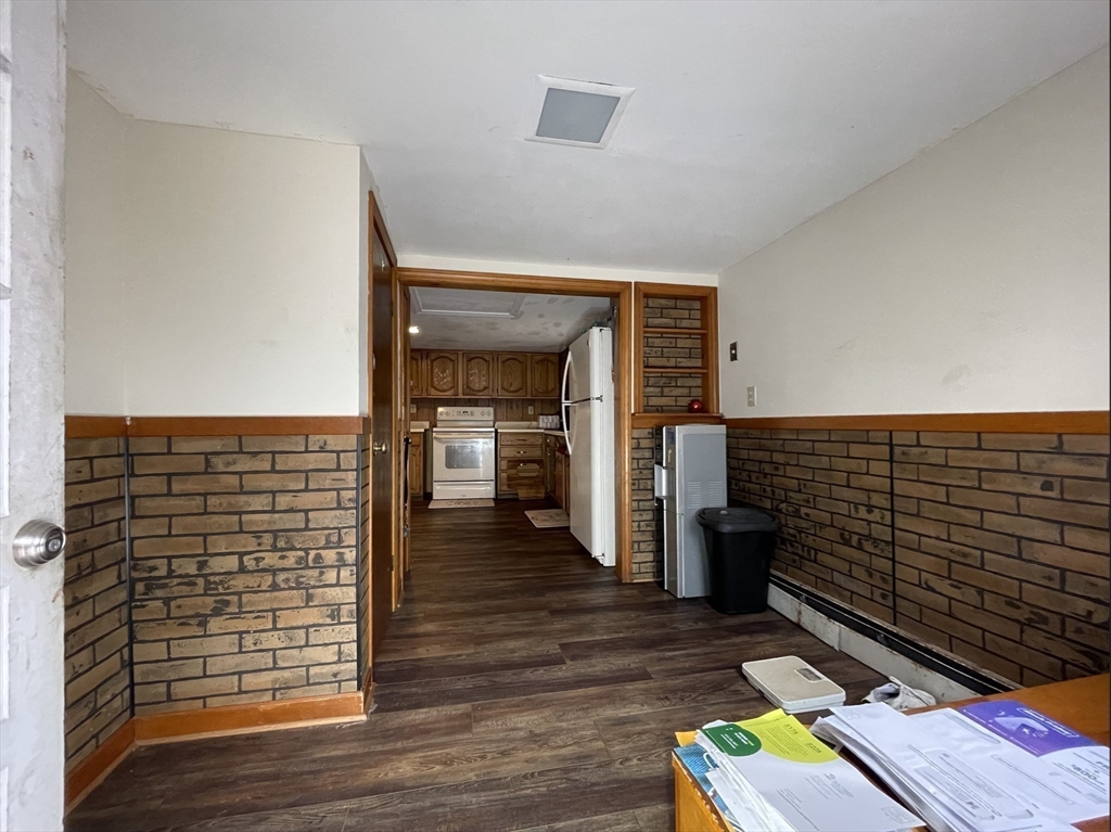 76 Aspen Street Ware, MA 01082 - Photo 13 of 25 a view of hallway with wooden floor