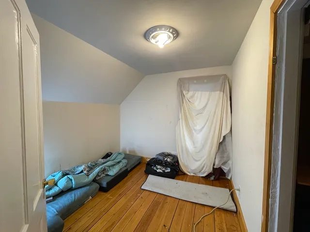 a room with toys and wooden floor