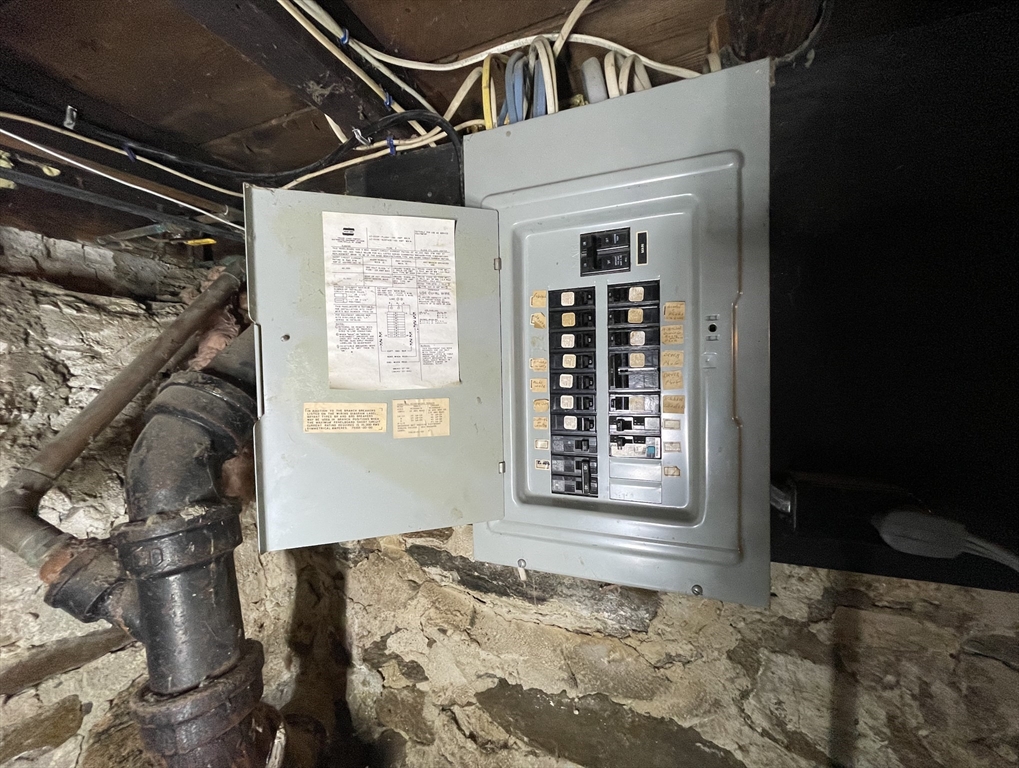 76 Aspen Street Ware, MA 01082 - Photo 24 of 25 a view of a livingroom with wooden floor and a window