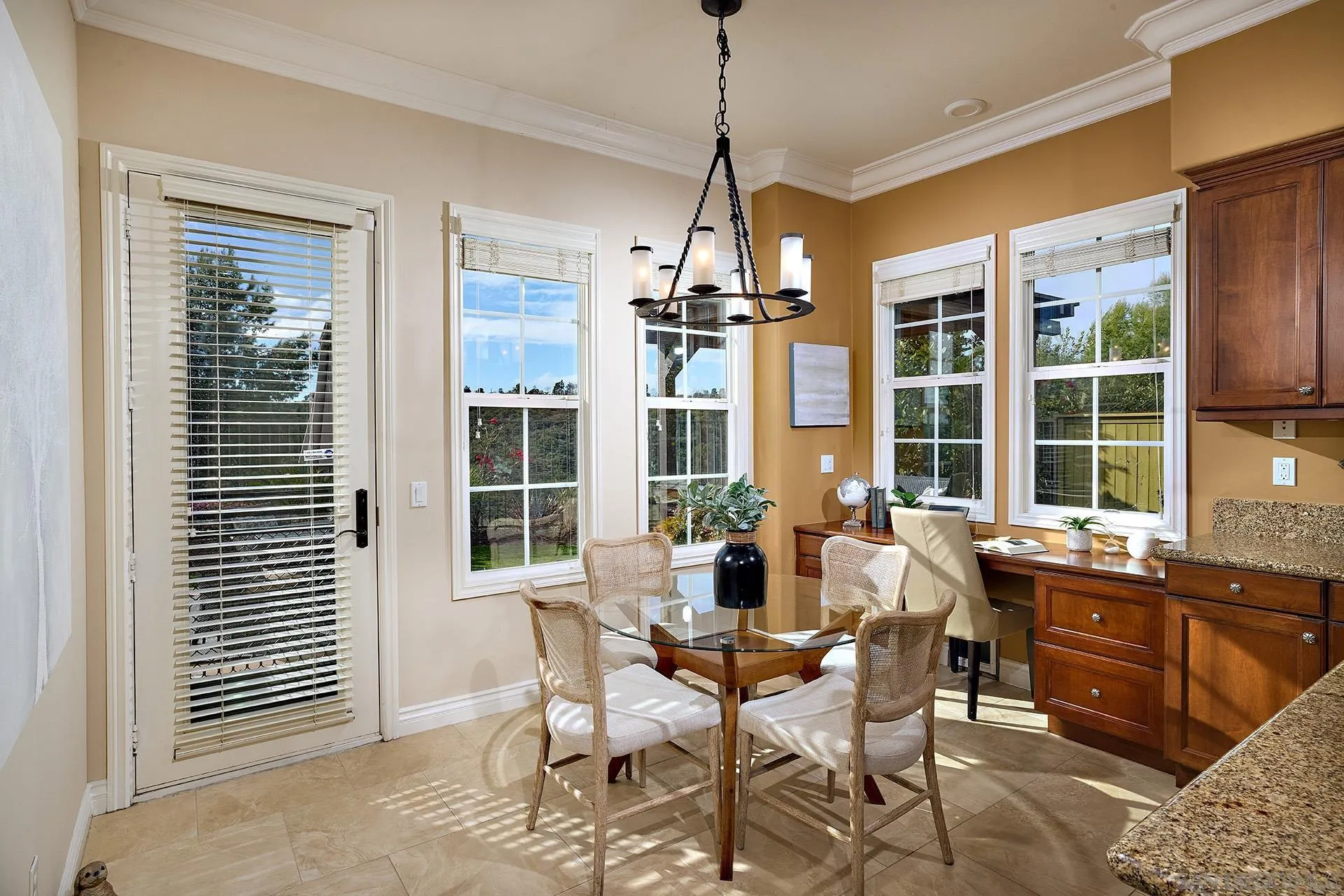 6615 Halite Place Carlsbad, CA 92009 - Photo 11 of 56 a dining room with a window and furniture