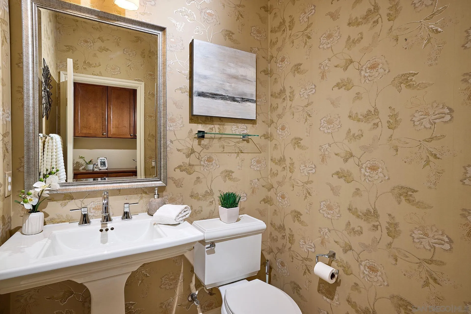 6615 Halite Place Carlsbad, CA 92009 - Photo 14 of 56 a bathroom with a granite countertop sink mirror and a toilet
