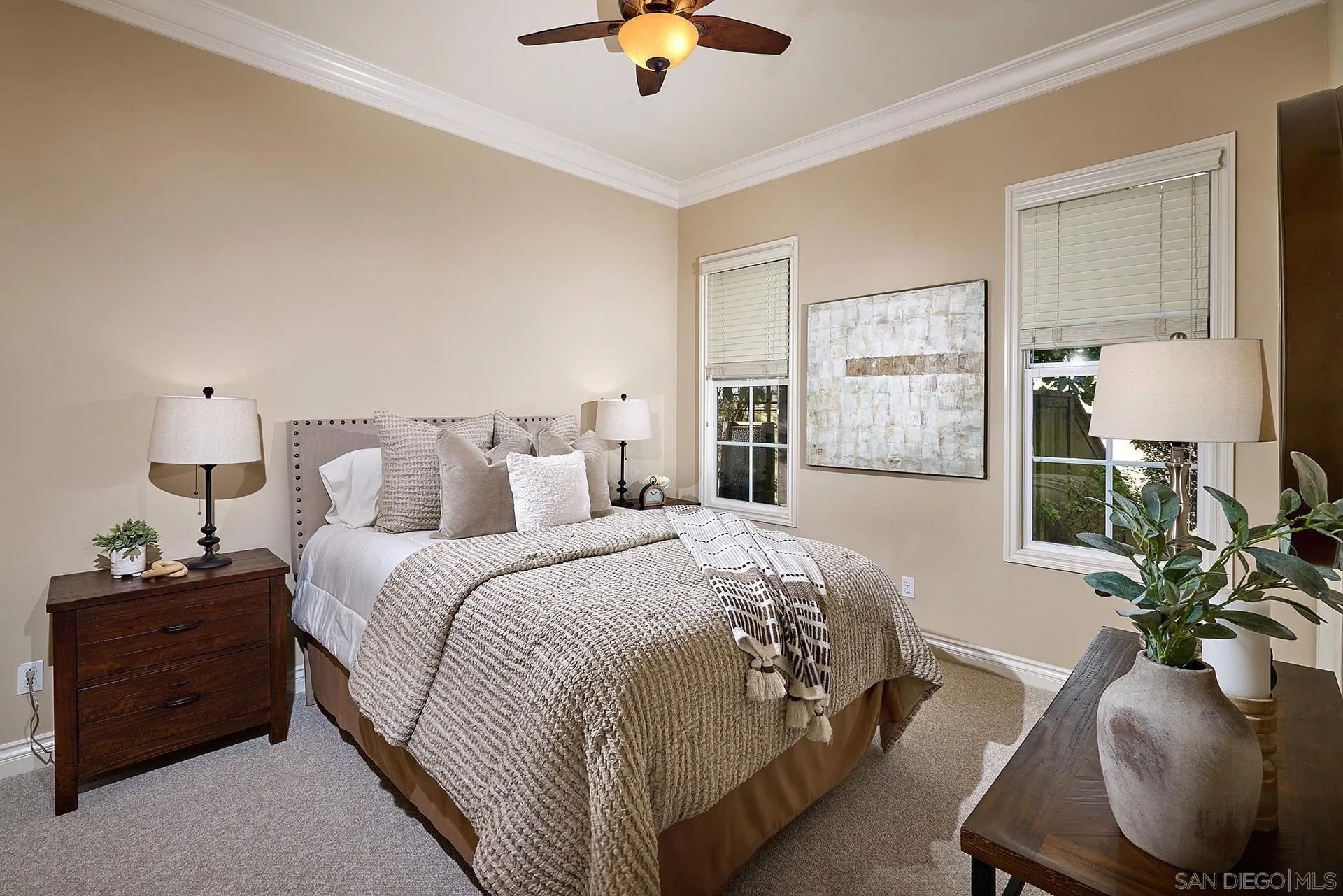 6615 Halite Place Carlsbad, CA 92009 - Photo 21 of 56 a bedroom with bed and a chandelier