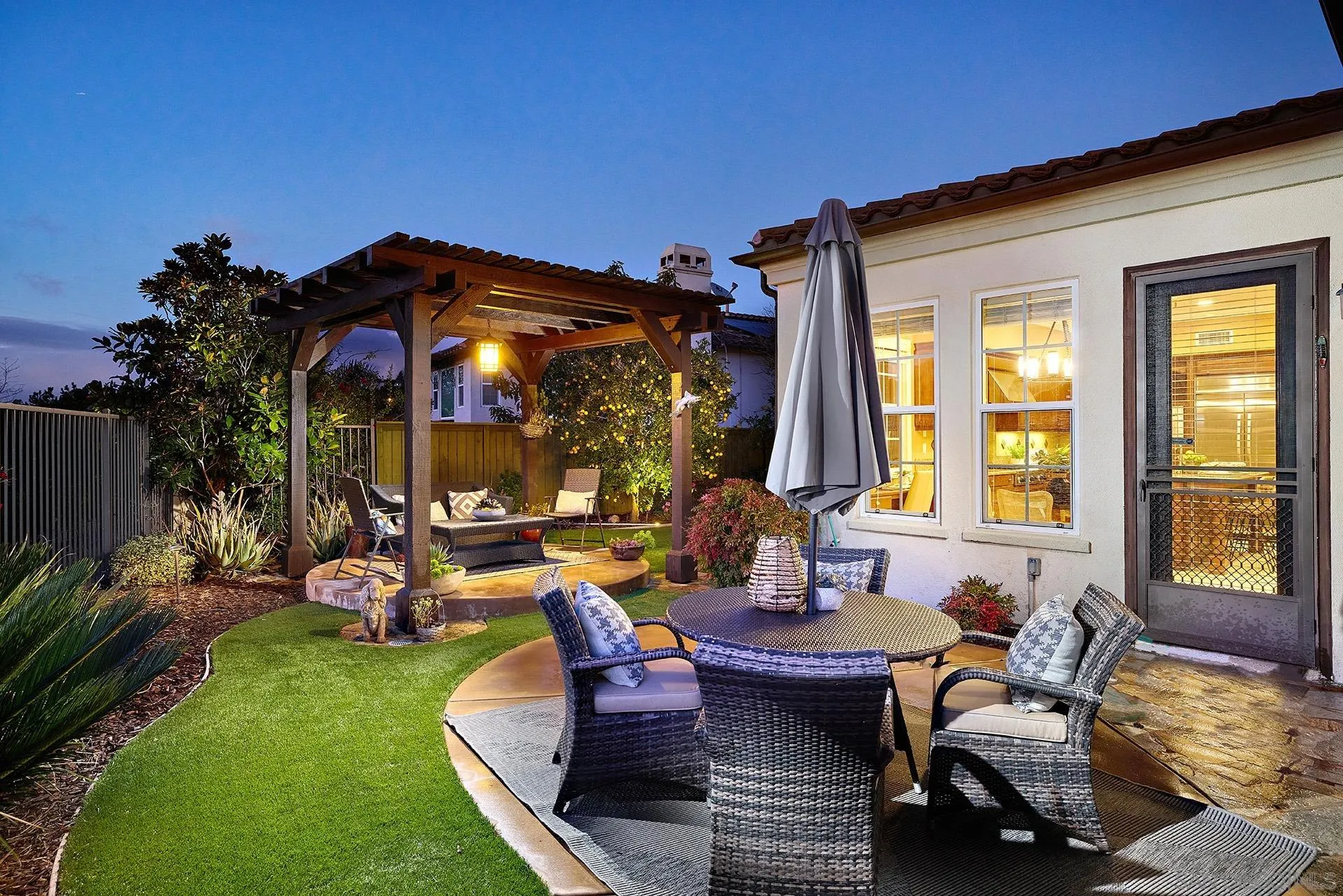 6615 Halite Place Carlsbad, CA 92009 - Photo 27 of 56 a view of a house with backyard and sitting area