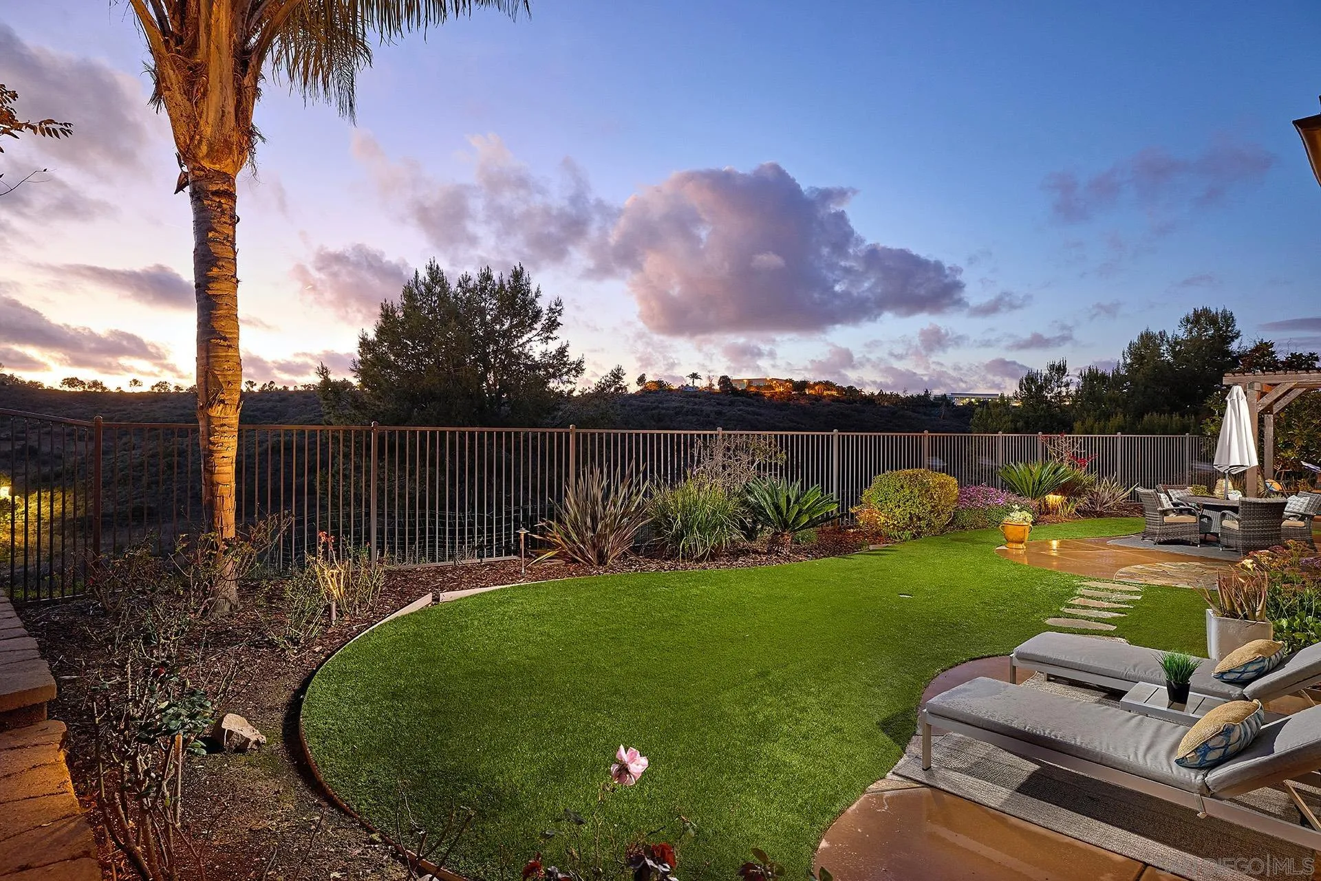 6615 Halite Place Carlsbad, CA 92009 - Photo 28 of 56 a view of a backyard with swimming pool
